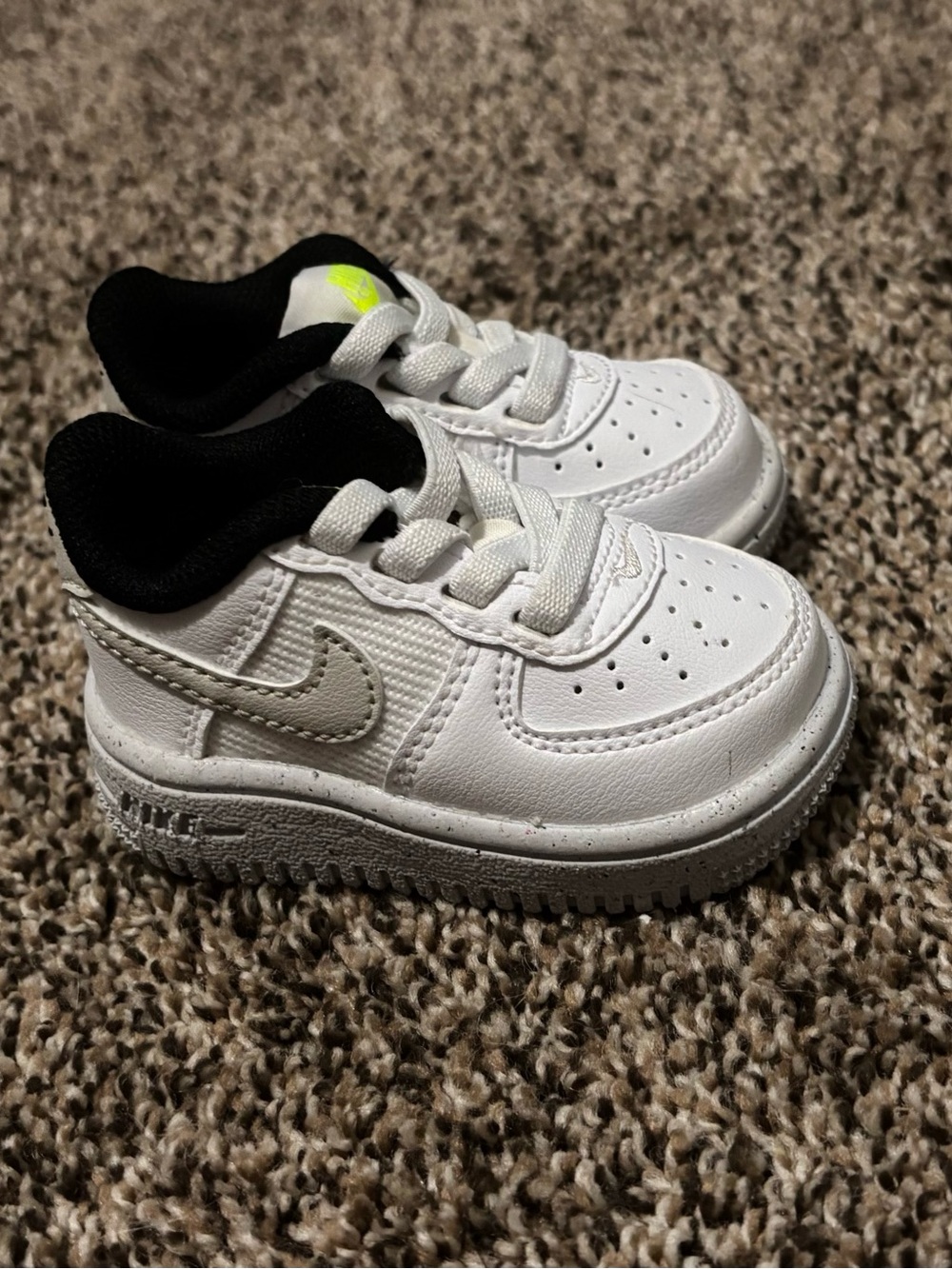 Nike Kids White Sneakers with Black Collar and Light Gray Swoosh